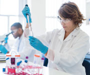 Scientist mixing something for study