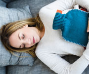 Woman sleeping with cold pack